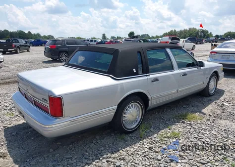 1997 Lincoln Town Car Cartier из США, поврежденный, VIN 1LNLM83W9VY629101